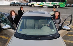 <p>From left Helen Mesi of Catering Services, Karen Logan of the School of Pharmacy, Lynn Zayachkiwsky of the President’s Office, and Laura Webb of the Alumni Association, carpool to campus from a commuter lot in Bolton. Photo by Peter Morenus </p>