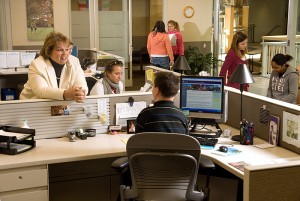 <p>Director Donna Korbel, left, chats with students in the Center for Students with Disabilities in the Wilbur Cross Building. Photo by Frank Dahlmeyer  </p>