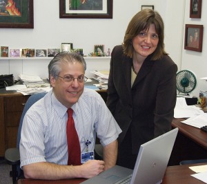 <p>Dr. Scott Wetstone and Wendy Soneson discuss the new online health education program. Photo by Carolyn Pennington </p>