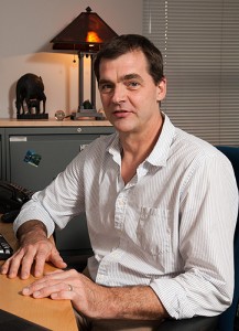 <p>Blair Johnson, professor of psychology, in his office in the Center for Health, Intervention, and Prevention section of the Ray Ryan Building. Photo by Frank Dahlmeyer</p>
