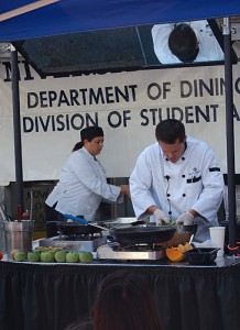 <p>UConn chef Rob Landolphi of Dining Services performs a cooking demonstration during Festival on the Green.</p>