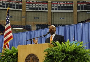 <p>Lee Melvin, interim vice president for enrollment management, addresses prospective students and families in Gampel Pavilion. Photo by Margaret Malmborg</p>