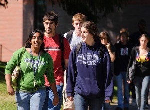 <p>Students walk along a sidewalk near the Chemistry Building. Photo by Peter Morenus</p>