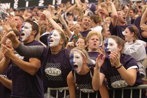 <p>Fans at a football game at Rentschler Stadium. Photo by Peter Morenus</p>