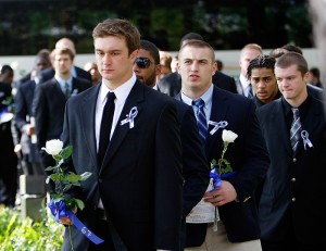 <p>UConn football players arrive for the funeral services of cornerback Jasper Howard in Miami. AP Photo/Alan Diaz</p>