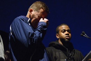 <p>Coach Randy Edsall and football player Kijuan Dabney. Photo by Jessica Tommaselli</p>