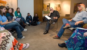 <p>Guthrie interacts with freshmen in the "Connecting with the Arts" class on Oct. 8. He discussed the social, political, and cultural events of the 1960s.</p>