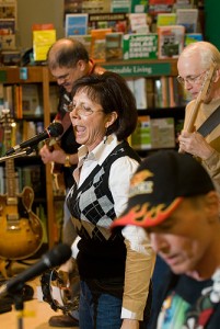 <p>Sociology Professor Davita Silfen Glasberg performs with Off Yer Rockers at the UConn Co-op. Photo by Frank Dahlmeyer</p>