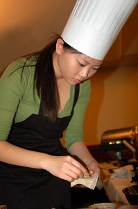 <p>Kathy Zhai made dumplings for her team, Oven McLoven. Photo by Gail Merrill </p>