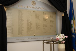 <p>The Roll of Honor at the Alumni Center contains the names of those UConn students and alumni who died in the service of their country. Photo by Tom Hurlbut</p>