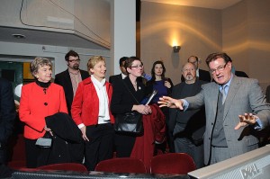 <p>Tim Hunter, professor of dramatic arts, right, explains the technology behind the CRT production of Galileo to legislators and representatives of Blue Sky Studios. Front row from left are Reps. Joan Lewis and Pam Sawyer, and Maryann Hanley and Rob Keating of the Office of Workforce Competitiveness. Photo by Peter Morenus</p>