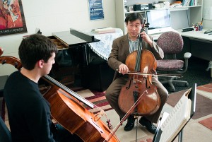 <p>Kangho Lee, associate professor of music, teaches cello in a one-on-one lesson with sophomore Samuel DeCaprio. Photo by Peter Morenus</p>