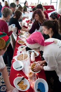 <p>Contestants race to get the ingredients they need at the start of the Gingerbread Competition. Photo by Frank Dahlmeyer</p>