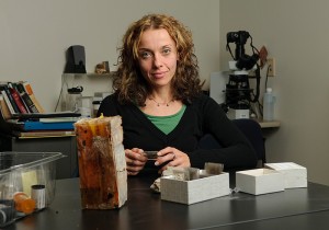 <p>Tiziana Matarazzo with samples at her lab in Beach Hall. Photo by Peter Morenus</p>