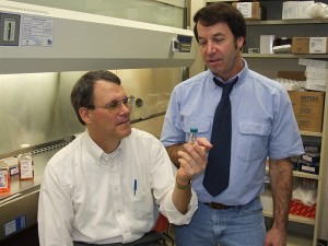 <p>Dr. Frank Nichols (seated) and Dr. Robert Clark at the UConn Health Center. Photo by Carolyn Pennington</p>
