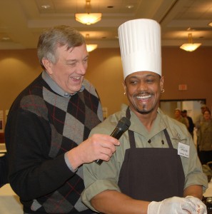 <p>Wayne Norman of WILI radio, interviews Chef Sammy Nieves during the Boiling Point competition. Nieves represented Team 7 from McMahon Dining Unit. Photo by Gail Merrill</p>