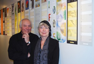 <p>Peter Good '65 and Jan Cummings Good '66 with their calendar exhibit at the Dodd Center. The exhibit runs through March 5. Photo by Suzanne Zack</p>