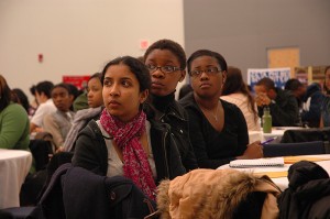 <p>Students listen as history professor Jeffrey Ogbar discusses the evolution of Hip-Hop music as the featured presentation for the opening ceremony of Black History Month. Photo by Margaret Malmborg</p>