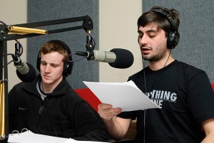 <p>Trey Nowell, left, a sophomore environmental policies major, and Justin Miller, a junior classics and ancient Mediterranean studies major, act in a WHUS radio drama. Photo by Jessica Tommaselli</p>