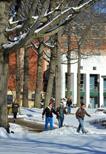 <p>Students walk to morning classes through the snow near the North Campus Residence Halls. Photo by Peter Morenus</p>