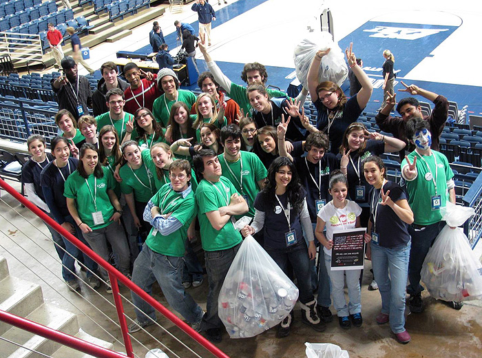 Students from the EcoHouse Learning Community students educated patrons about recycling on Green Game Day at Gampel Pavilion. Photo by EcoHouse