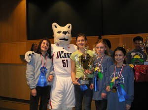 <p>The winning team from the Solar Car Race was from the Pomfret Community School in Pomfret, Conn.  The team is shown here with Jonathan the Husky. Photo by Sarah Louise Upjohn</p>