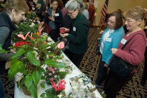 <p>Participants in the 8th annual Garden Conference look over plants for sale. Photo by Daniel Buttrey</p>