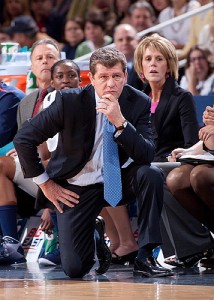 <p>Geno Auriemma watches the Huskies as they won their record-setting 71st consecutive game in the semi-finals against Notre Dame in the Big East Championship held at the XL Center in Hartford. Photo by Stephen Slade</p>