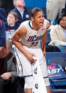 <p>Maya Moore shouts encouragement to her teammates during the Huskies’ historic 71st straight win in the Big East Championship at the XL Center in Hartford. Photo by Stephen Slade</p>