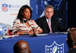 <p>Kelci Stringer, left, KSI founder and widow of Korey Stringer, and James Gould, Stringer's former NFL agent at a press conference announcing the formation of the Korey Stringer Institute. Photo by Peter Morenus</p>