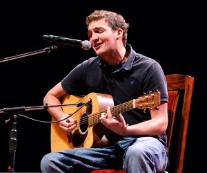 <p>Greg Sember, a senior chemistry major, sings at UConn Idol in the Jorgensen Center for the Performing Arts. Photo by Jessica Tommaselli</p>