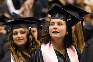 <p>Gabrielle Greenlee, right, at the CLAS Graduation Ceremony at Gampel Pavilion, May 9th, 2010. Photo by Lauren Cunningham</p>