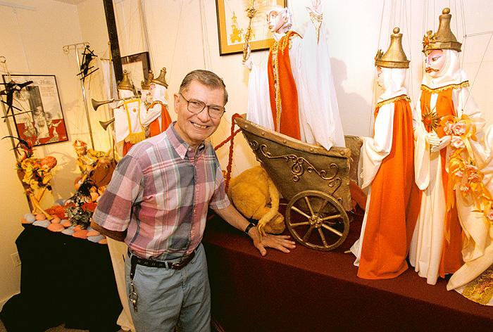 <p>Frank Ballard, at the puppetry museum with a display of puppets from "The Magic Flute". Photo by Peter Morenus</p>