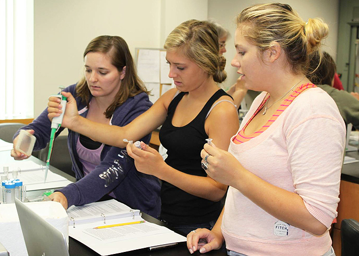 <p>The goal of Camp DNA is to provide future Connecticut high school science teachers with the training and tools to use these experimental lab exercises in thier high school classrooms.  Shown here are(L to R) Brittani Mango, Deana Semenza, and Tara Butler </p>