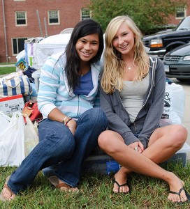 <p>Freshmen roommates Asya HunterChu left, and Amy Richardson unpack their belongings and prepare to move into the Northwest Campus Residence Halls at the start of the 2009-2010 school year. Photo by Peter Morenus</p>
