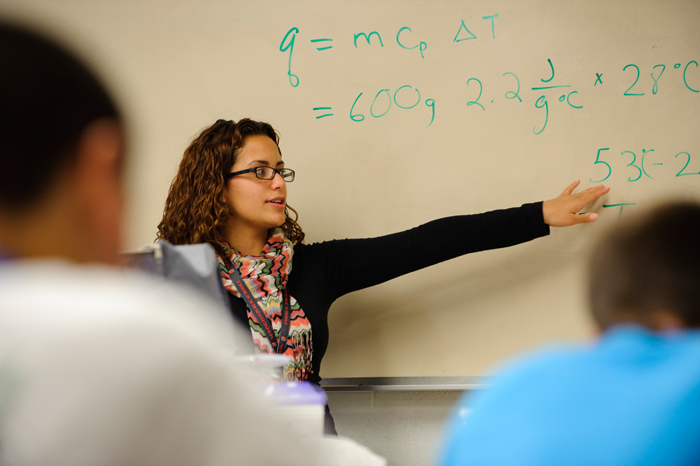<p>Lorna Carrasquillo, a graduate student in Education, is a student teacher of science classes at Newington High School. Photo by Peter Morenus</p>
