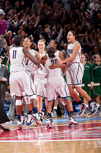 <p>The women's basketball team celebrates another victory. Photo by Steve Slade</p>