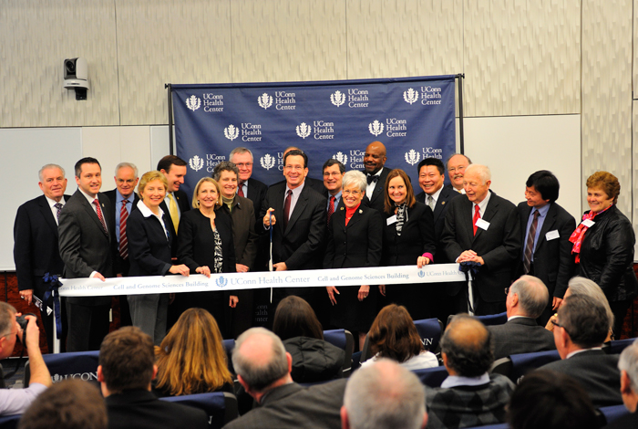 <p>A ribbon cutting ceremony held in the Edmund and Arlene Grossman Auditorium for the dedication of the Cell and Genome Science Building at the UConn Health Center. Photo by Peter Morenus</p>