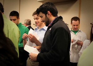 Fourth-year medical students opening their envelopes to find out what residency program they've been accepted into during Match Day 2011.