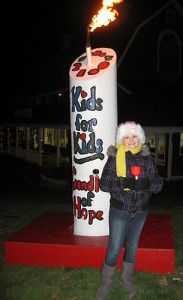 Roxie Kubis, 12, lit the Kids for Kids Candle of Hope at Riverdale Farms in Avon on December 3, 2010. (Ann Marie Potter/Avon Patch)