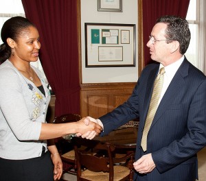 <p>Senior women's basketball player Maya Moore was congratulated by Governor Malloy for an outstanding season. Photo provided by Athletic Communications</p>