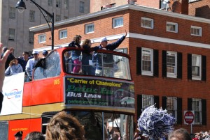 <p>The players and Coach Calhoun responded to the crowd from the top of a double-decker bus that circled from the State Capitol around Bushnell Park, down Main Street, and along Capitol Avenue.  Photo by Peter Morenus.</p>
