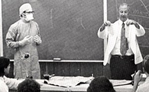 Dental faculty teaching students in a classroom. (UConn Health Center Photo Archive)