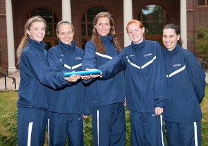 <p>The 400 x 800 relay team (L-R) Sophomore Brigitte Mania, Senior Leah Andrianos,Senior Meghan Cunningham, Junior Heather Wilson and Distance Coach Andrea Grove-McDonough. Photo courtesy of Athletic Communications</p>