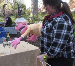 <p>Leah Sylvain, a puppetry major, made sure her underage companion didn’t actually sample the bubbly.</p>