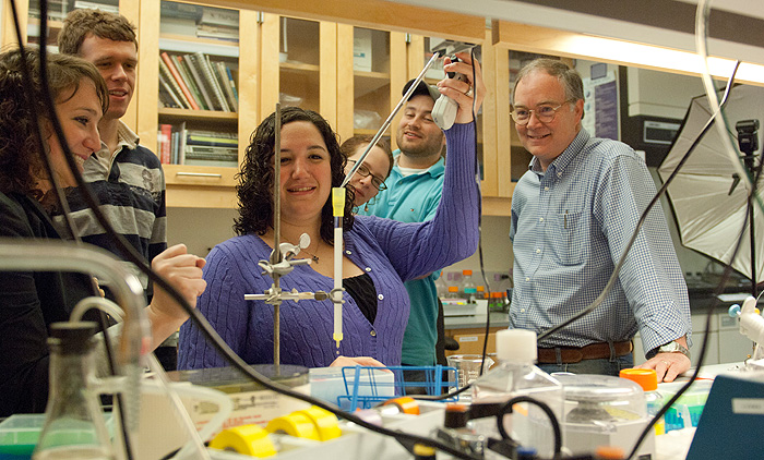 Graduate students, from left, Kathryn Pietrosimone, Ryan Molony, and Clare Melchiorre; undergraduate Meaghan Roy-O'Reilly, a University Scholar; and graduate student Peter Reinhold in the lab with Professor Michael Lynes.
