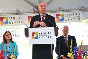 U.S. Rep. Joe Courtney speaks at the groundbreaking ceremony for the new Storrs Center, on June 29, 2011. At left is Secretary of State Denise Merrill. At right is Philip Lodewick, president of the Mansfield Downtown Partnership.