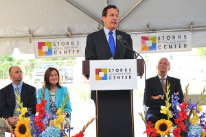 Governor Dannel Malloy speaks at the groundbreaking ceremony for the new Storrs Center, on June 29, 2011. At left is state Rep. Greg Haddad and Secretary of State Denise Merrill. At right is Philip Lodewick, president of the Mansfield Downtown Partnership.