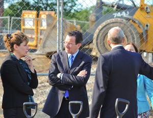 President Susan Herbst, left, and Governor Dannel Malloy speak during the groundbreaking ceremony for the new Storrs Center, on June 29, 2011.