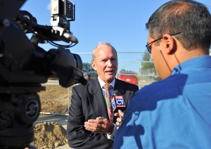 Philip Lodewick, president of the Mansfield Downtown Partnership speaks with the media groundbreaking ceremony for the new Storrs Center, on June 29, 2011.